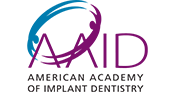The image displays a logo with a stylized purple and blue bird graphic, accompanied by text that reads  AID  in large letters at the top, followed by  Animal Assisted Therapy  below in smaller font. The logo has a colorful design with a gradient background transitioning from light to darker shades of purple and blue.