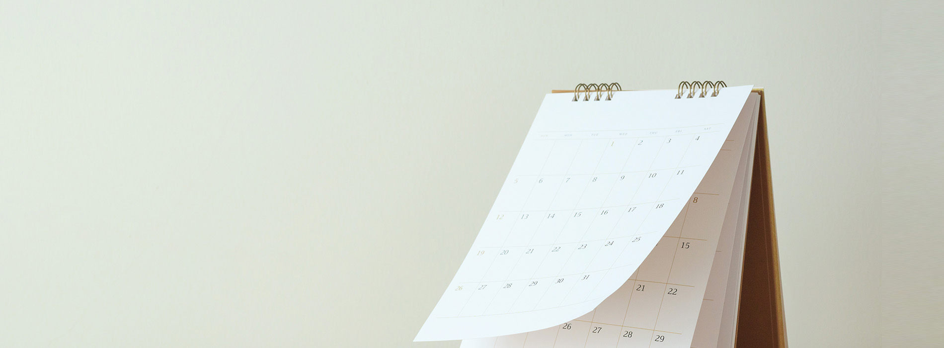 The image shows a calendar with dates printed on it, displayed against a plain background.