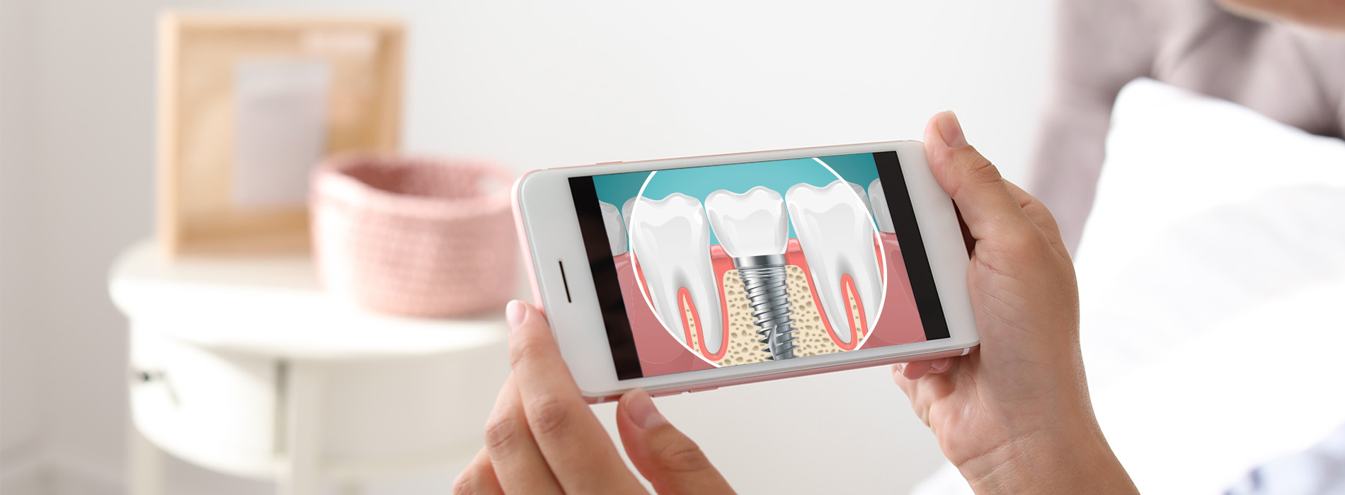 A person holding a smartphone displaying a video of a toothbrush cleaning teeth with an animated gif overlay showing a progression of cleanliness from dirty to clean.